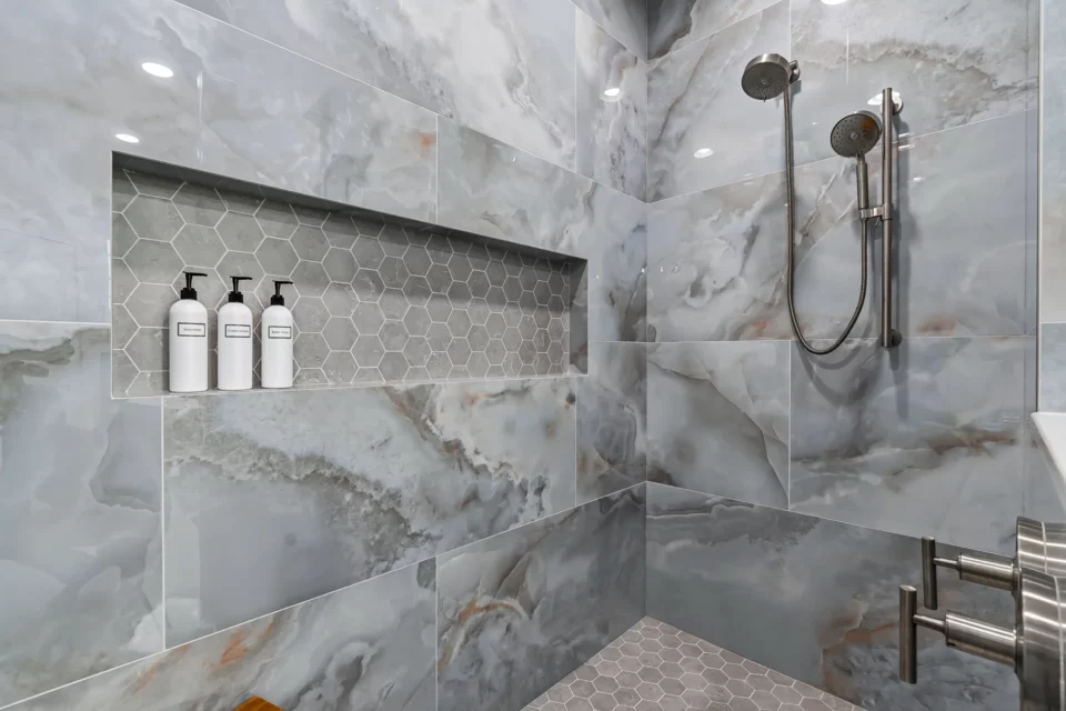 A finished primary bathroom by Wake Remodeling