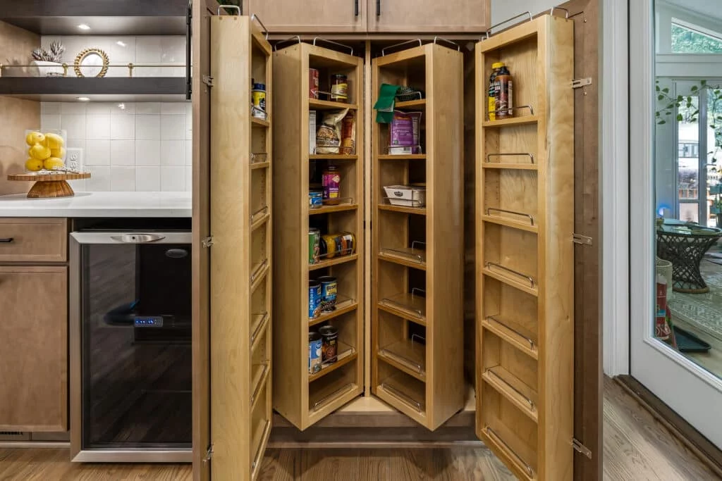 Kitchen Renovation Cary NC: Creating Kitchens Designed for Everyday Living 2 Built-in pivot pantry doors in a completed remodel.