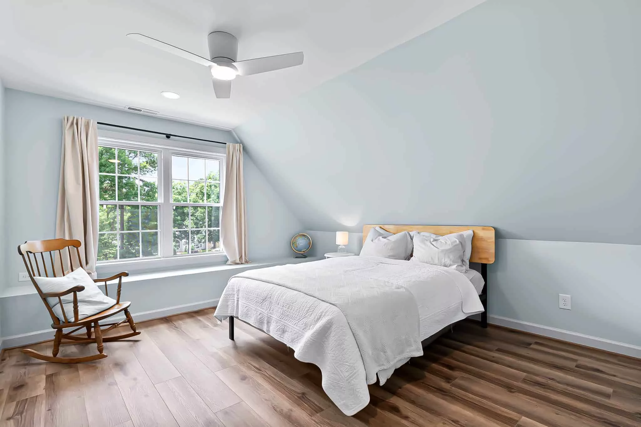 A finished attic guest suite designed to feel comfortable, private, and fully integrated with the home.