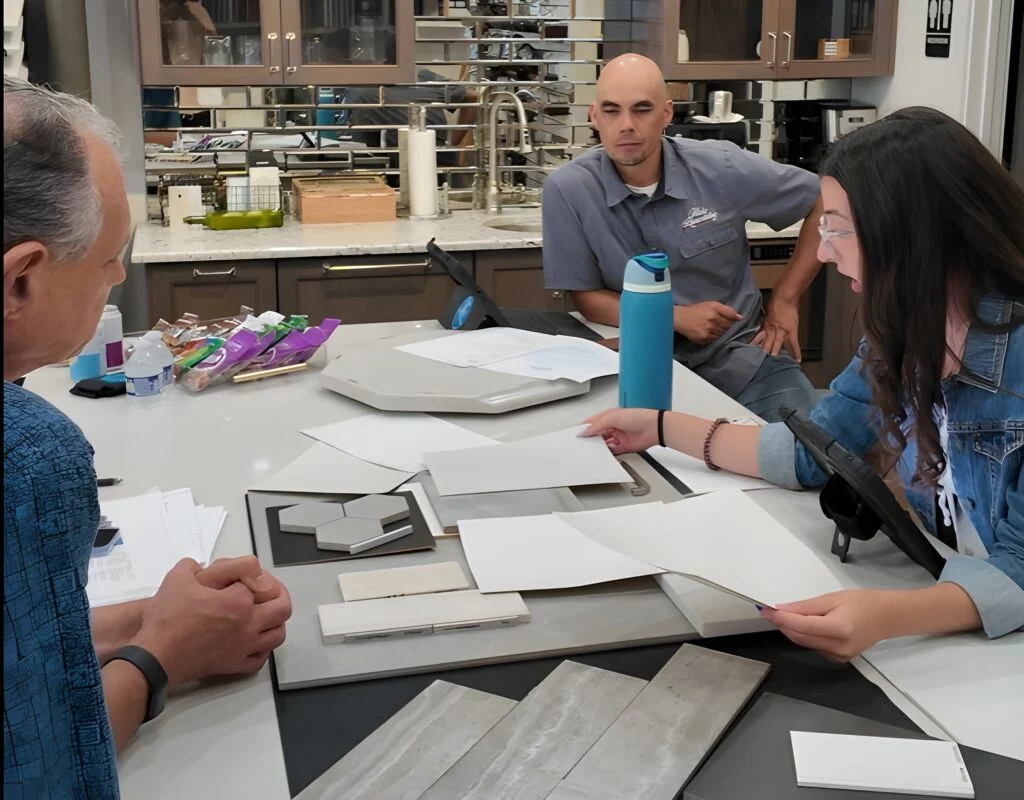 Conceptual Design Phase: Building the Foundation for a Successful Remodel 2 Homeowners meet with our designer in the showroom during the conceptual design phase.