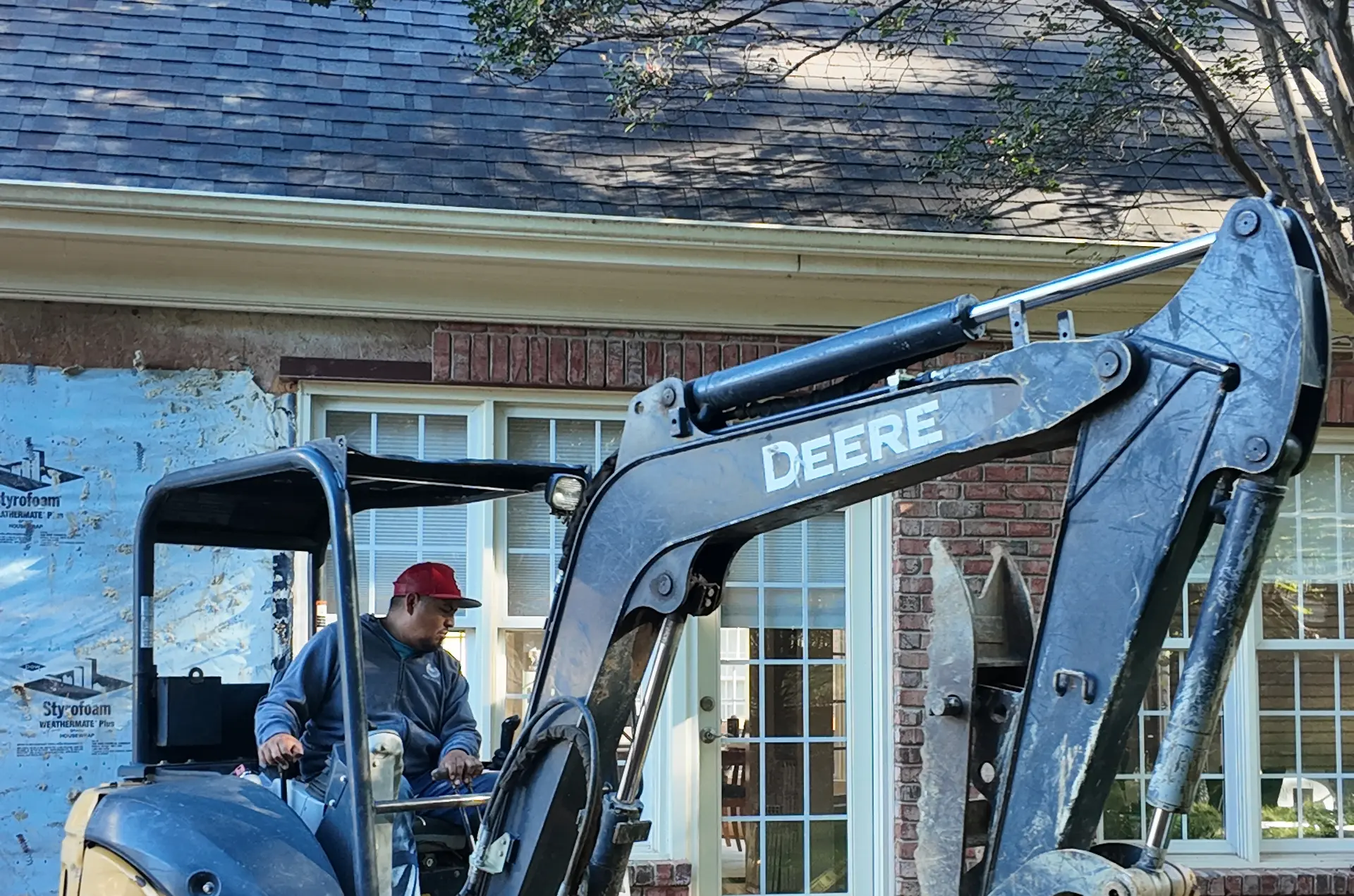 Wake Remodeling excavator beginning site preparation for a home remodel